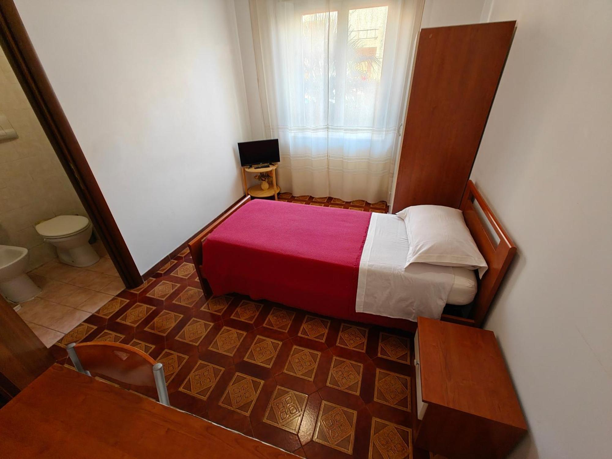Camera Singola con Bagno Privato